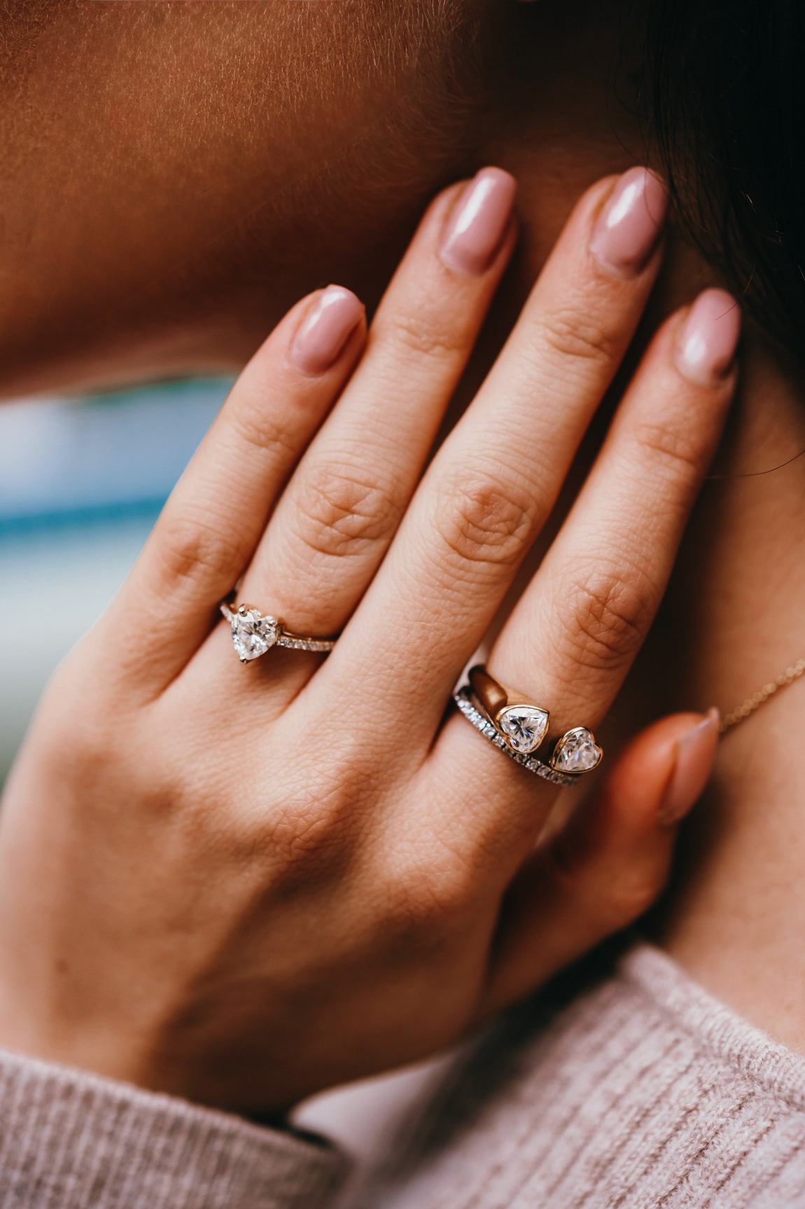 Anillo doble corazón con diamante